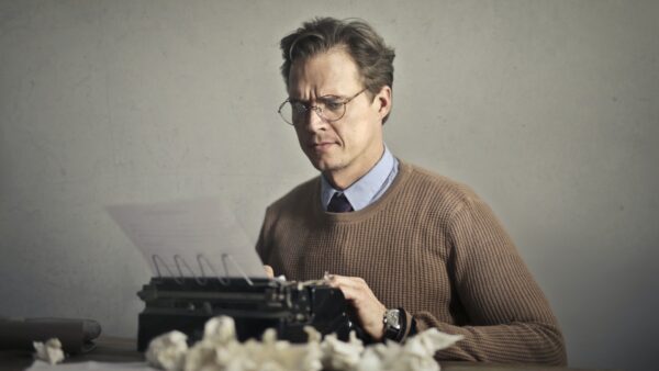 A person using a typewriter