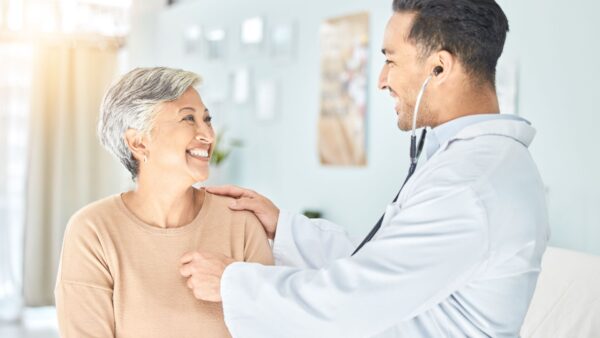 Male doctor with a female patient