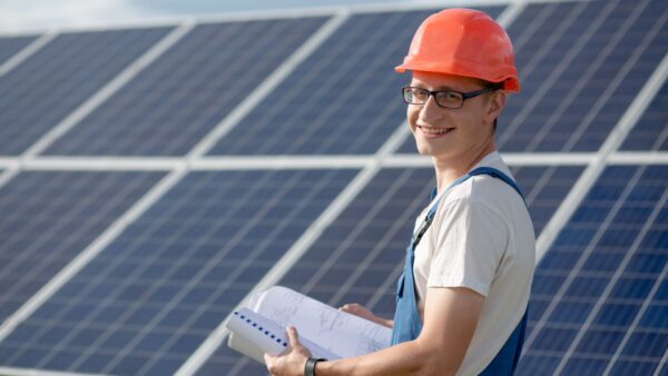 Solar engineer with solar panels