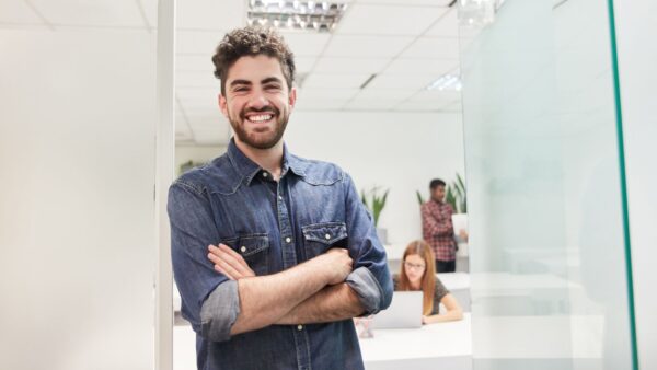 Male startup founder smiling
