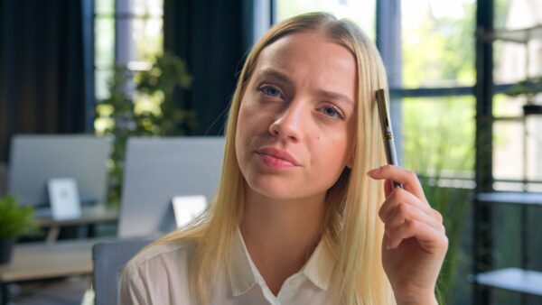 Portrait of pensive businesswoman