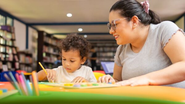Teacher with child at daycare center