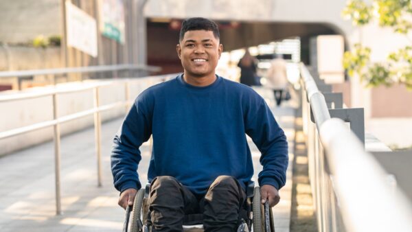 Male person smiling with disability