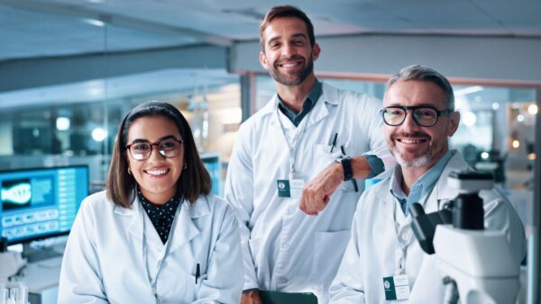 Collaboration, portrait and science with people in laboratory together for breakthrough or development